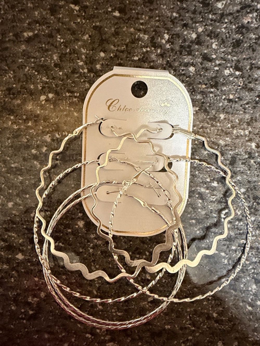 Source Unknown Silver Wavy and Twisted Hoop Earring Set